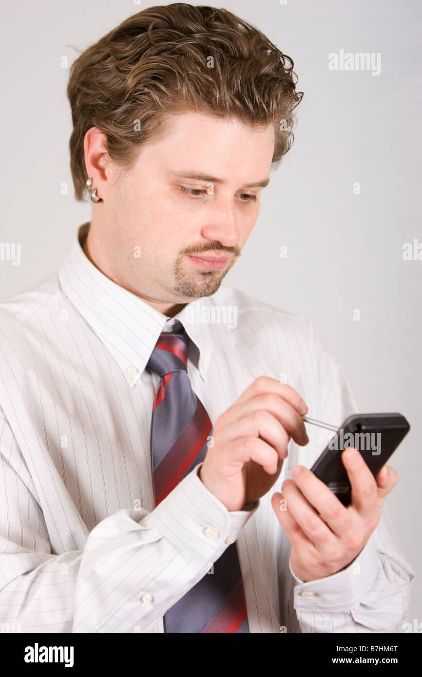 Young businessman is working on PDA Stock Photo Alamy
