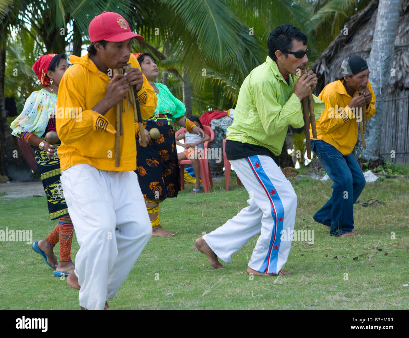 Local Kuna Indians practicing a traditional dance on Isla Pelikano, San Blas Islands, Panama Stock Photo
