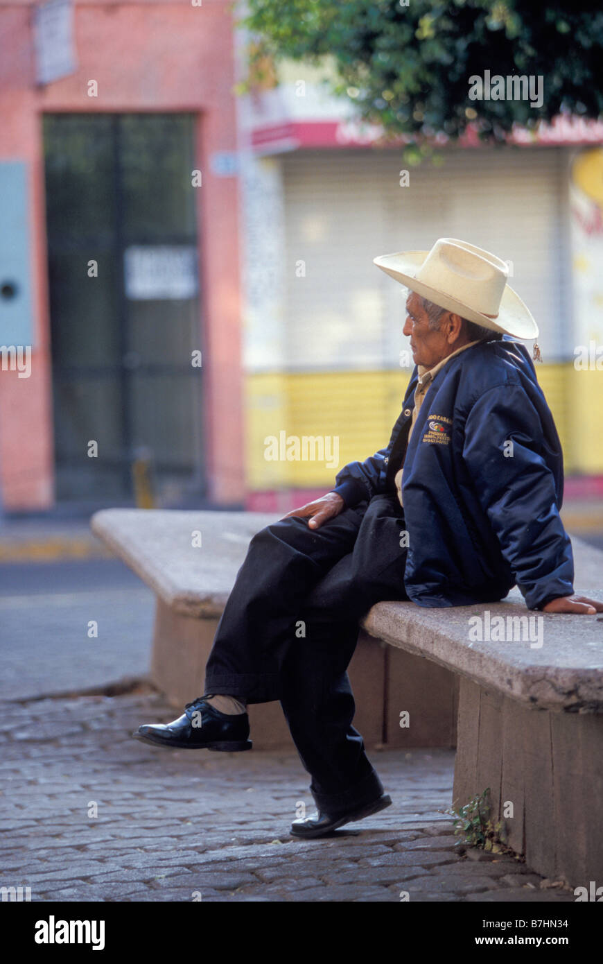 Mexican man in cowboy hat hi-res stock 