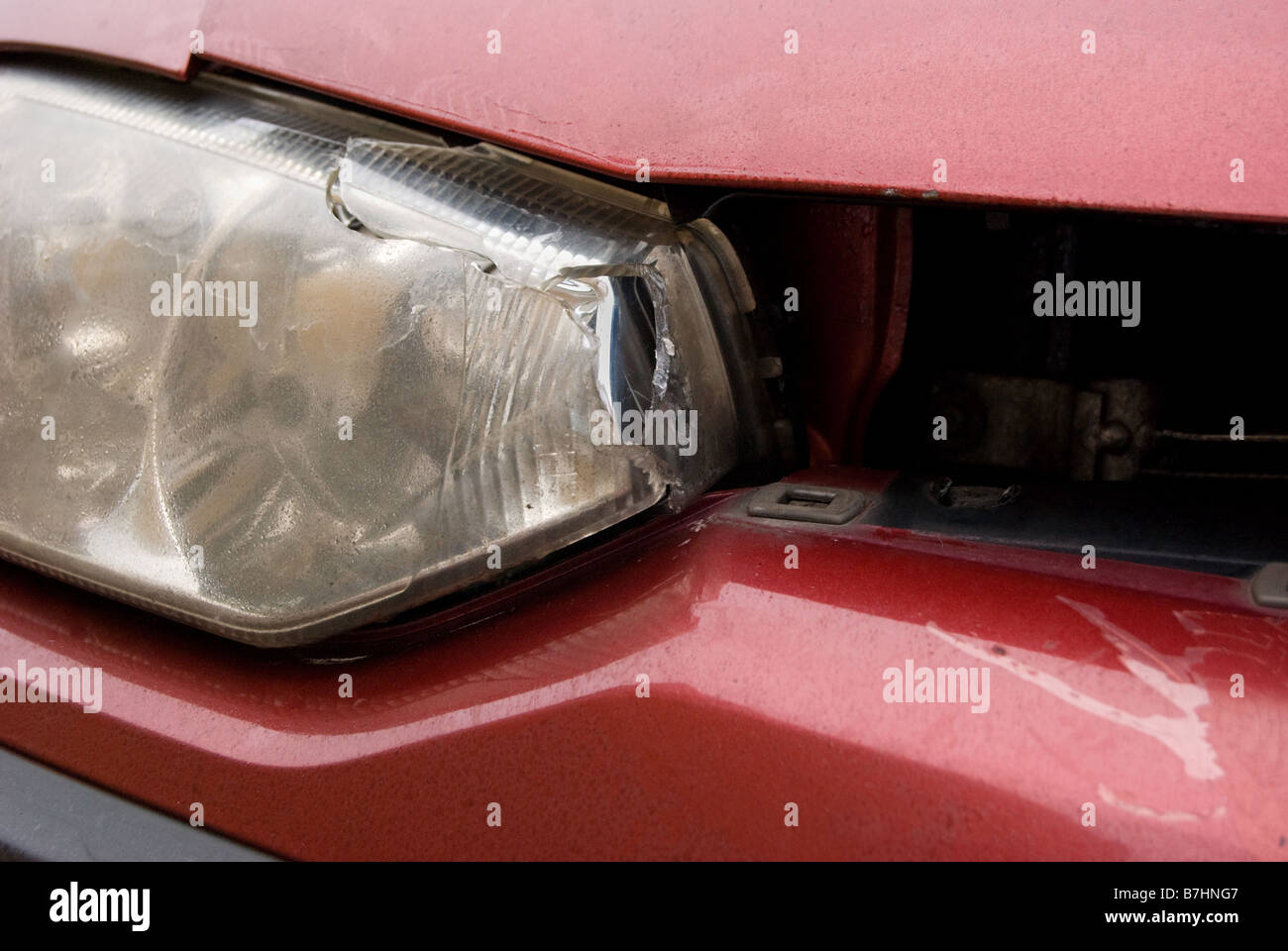 Close up of collision damage  to car bumper and headlight Stock Photo
