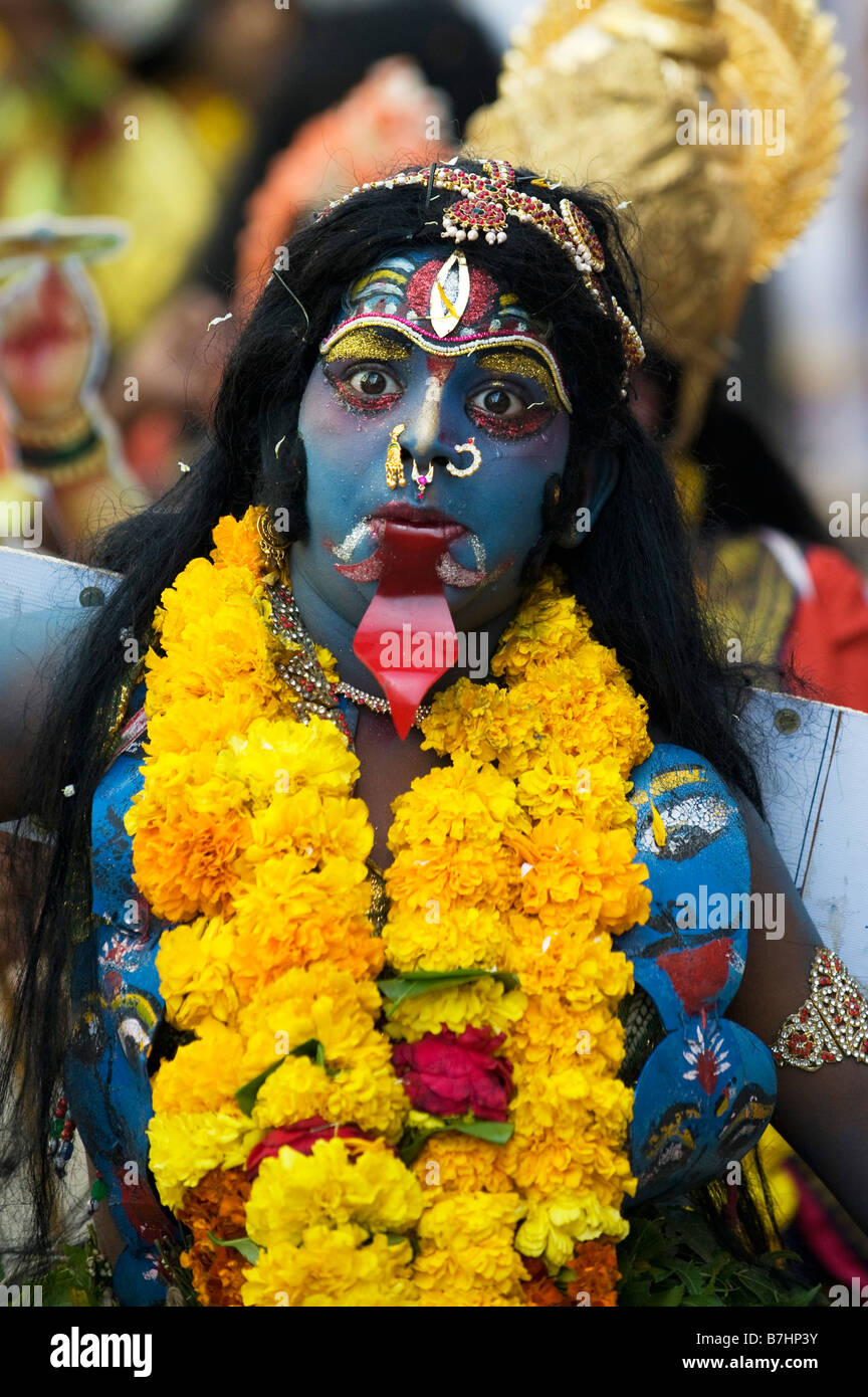 Indian Child dressed up as the Hindu God Durga / Kali for a street pageant in the town of Puttaparthi, Andhra Pradesh, India Stock Photo