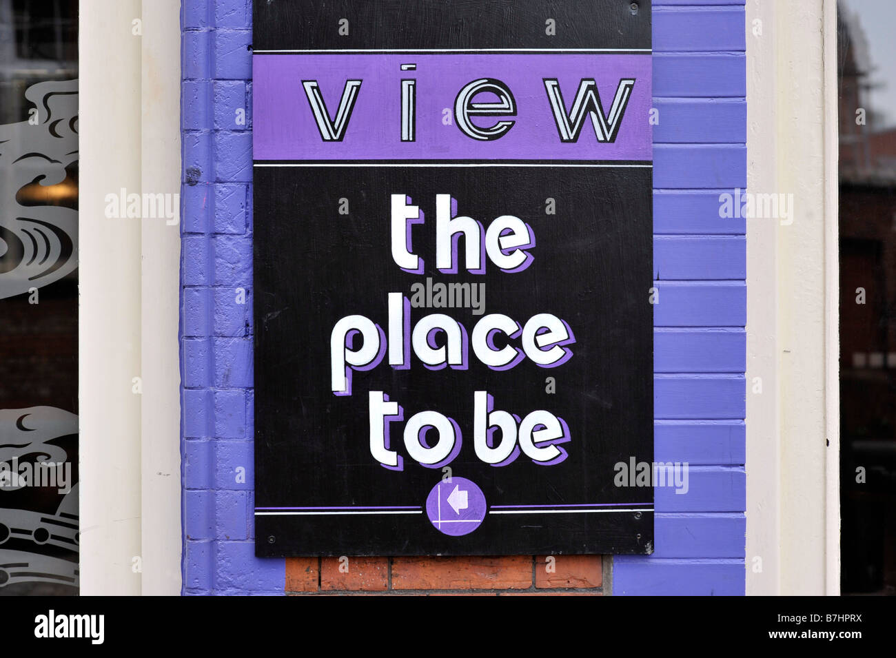 view the place to be sign gay bar canal street manchester uk Stock Photo
