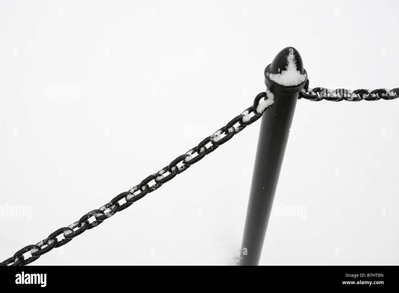 Snow covered chain link fence Stock Photo Alamy