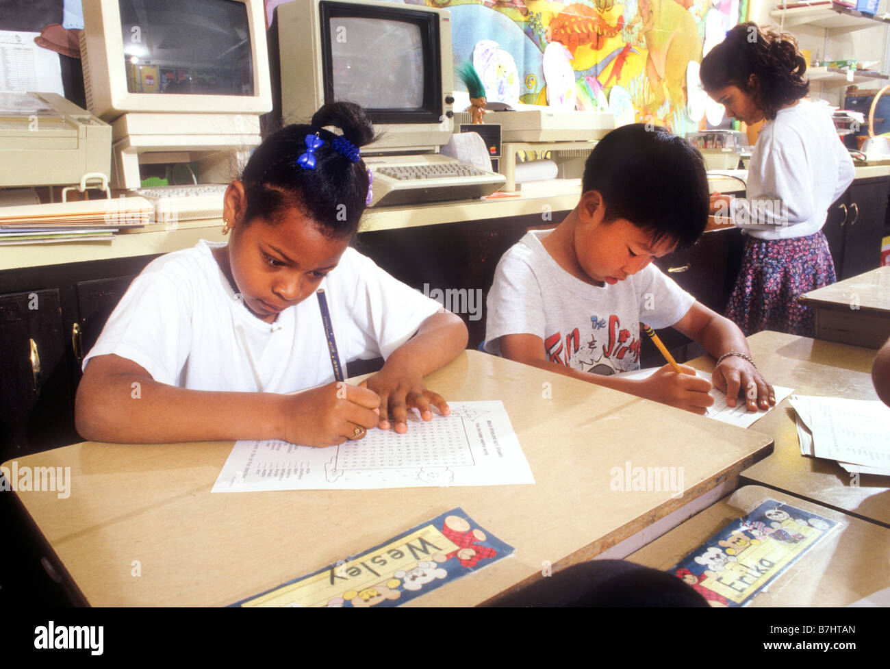 Elementary school students study in class Stock Photo - Alamy