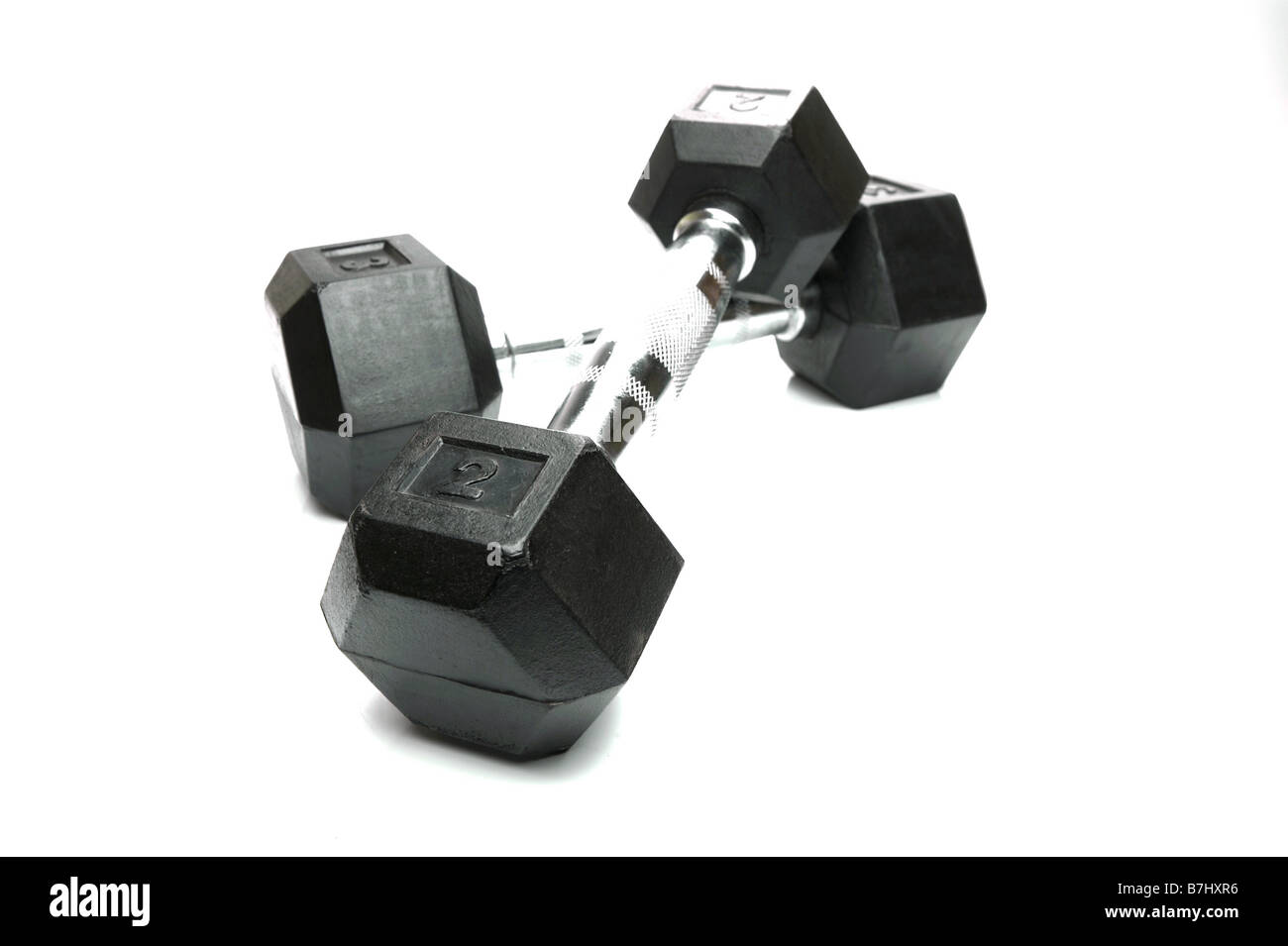 Weight lifting dumbbells isolated against a white background Stock Photo