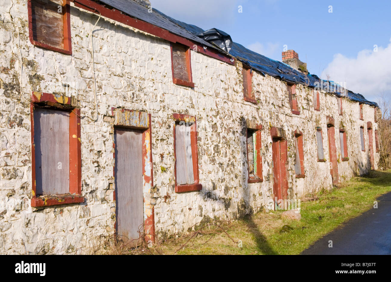 Boarded Up Derelict Row Of 4 Terraced Stone Cottages For Sale By