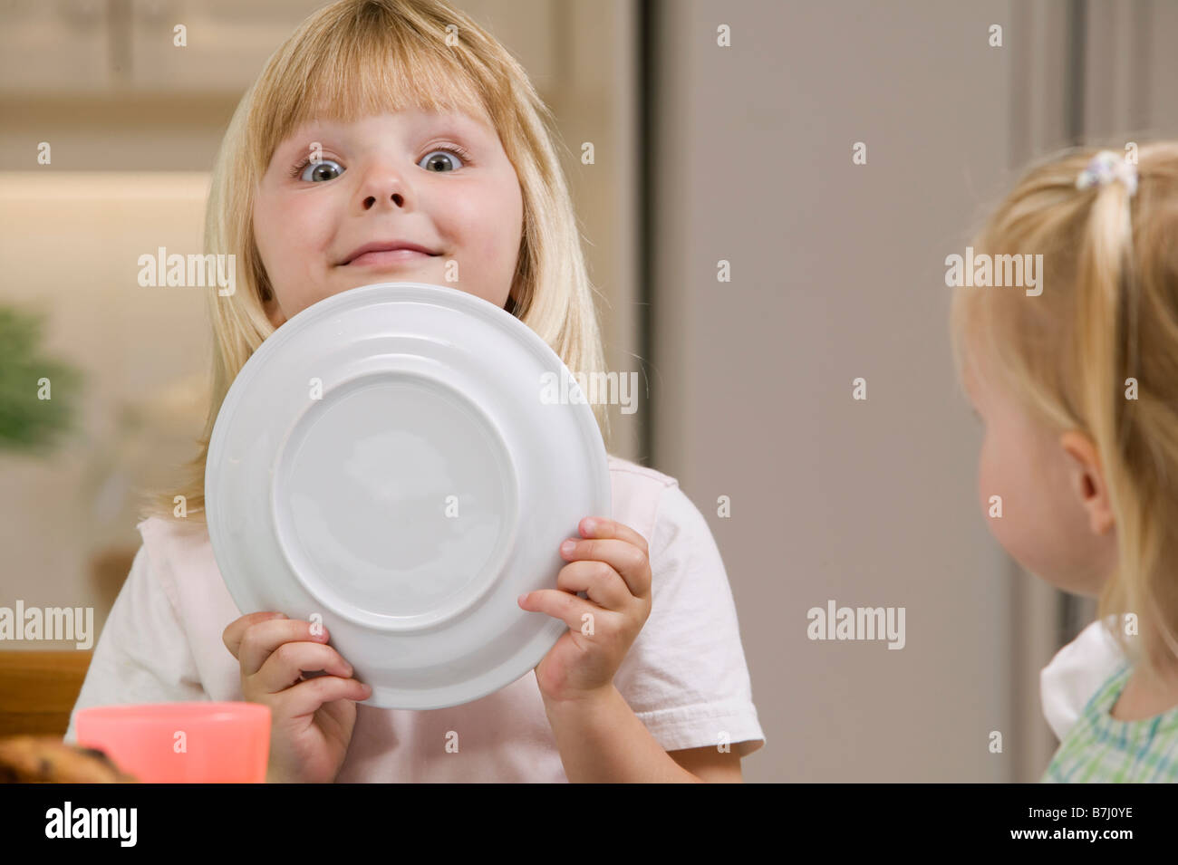 5 Year Old Playing Around During Breakfast B C Stock Photo Alamy