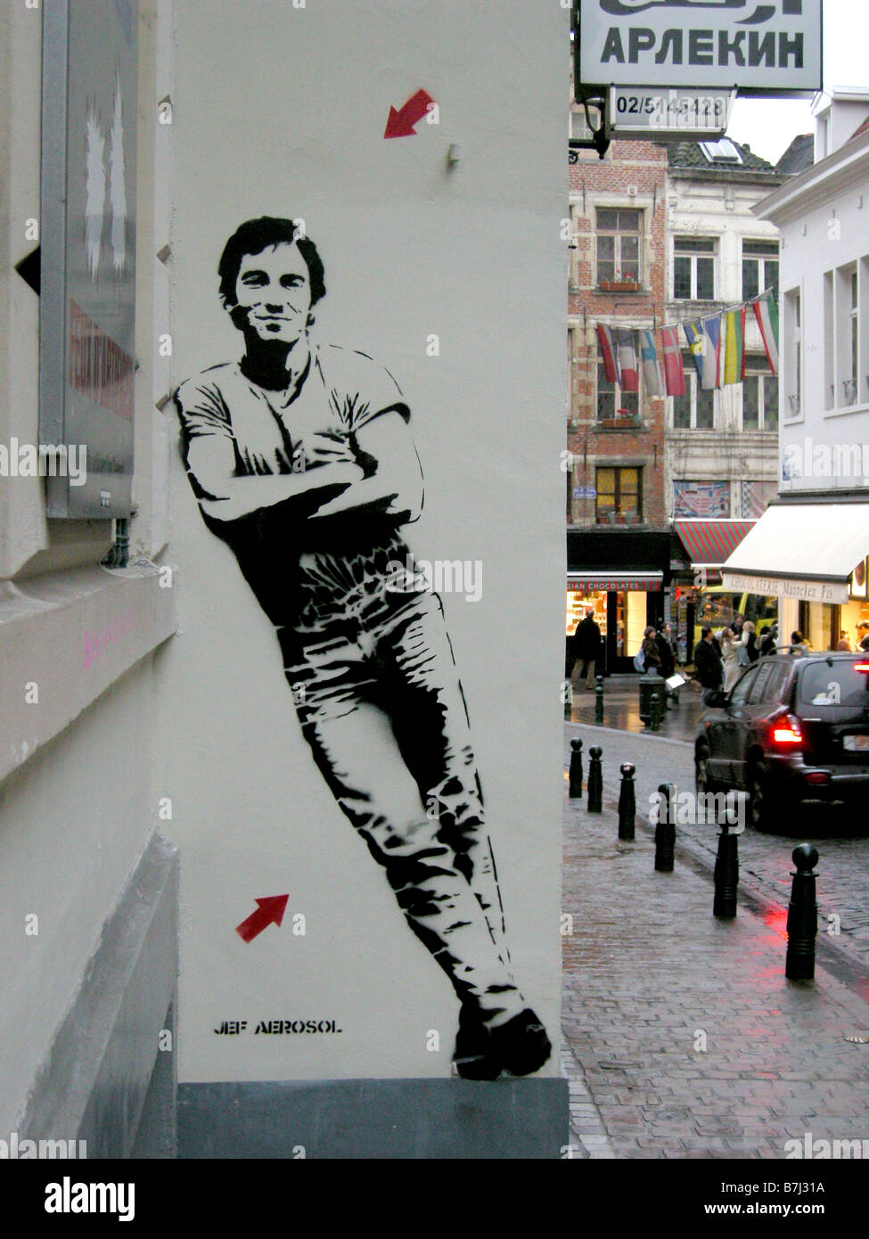 Graffiti artist Jeff Aerosol red arrow ,Bruce Spingsteen, Rue du Chêne, Brussels Belgium Stock Photo