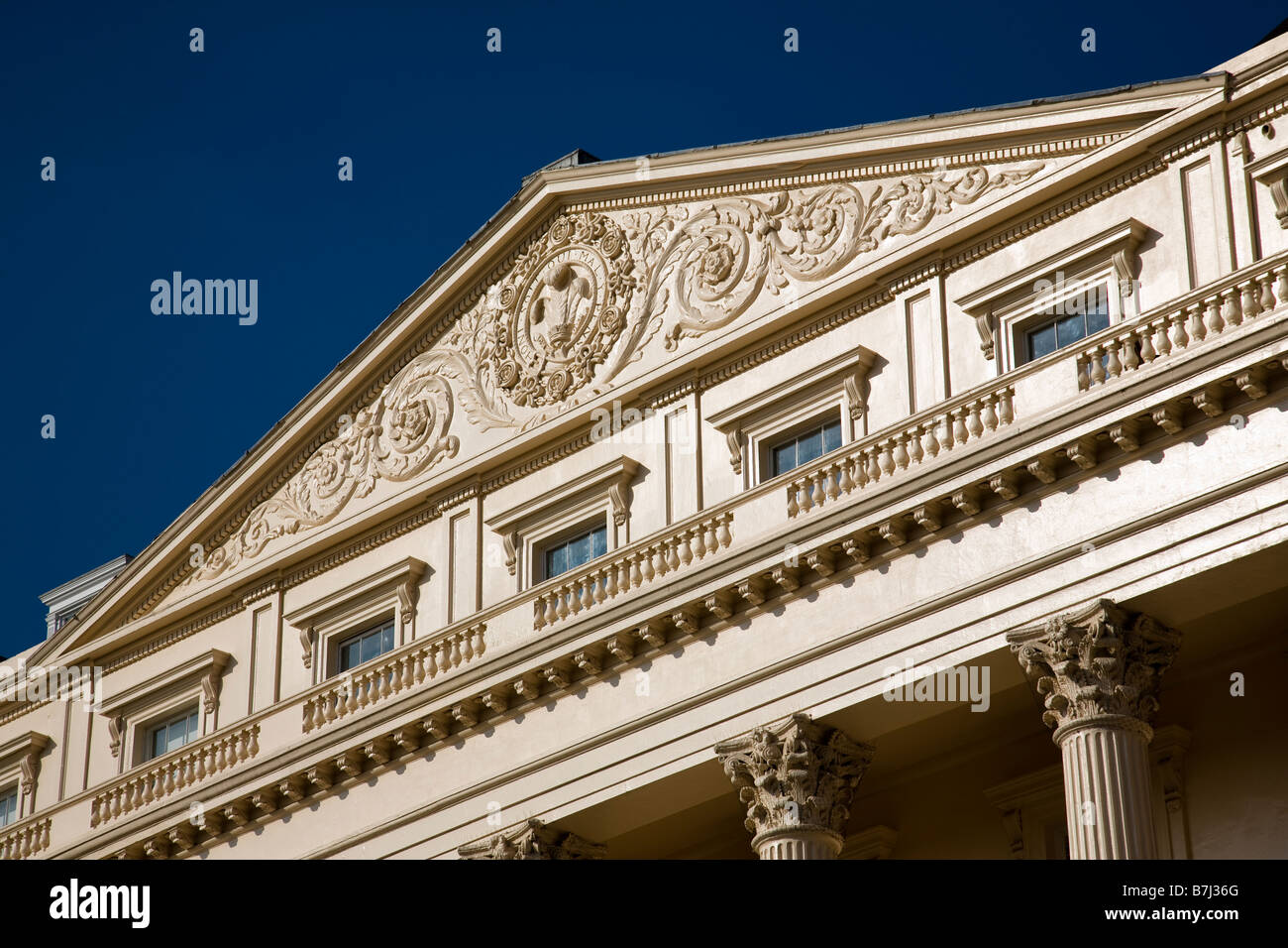 The upper portion of the facade of Carlton House Terrace, London, England Stock Photo