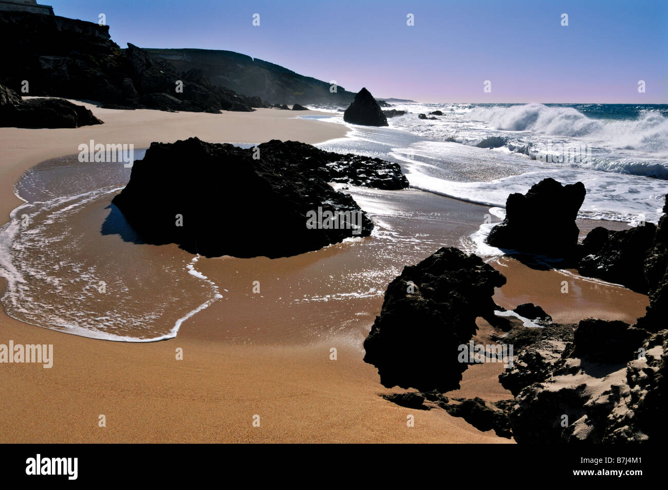 Rocks and waves at the beach of Porto Covo at Pessegueiro Island Stock Photo