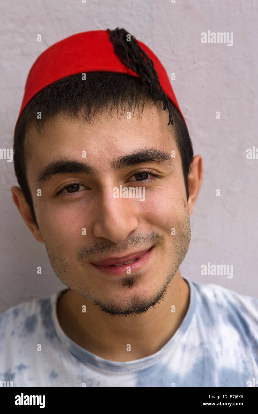 Young Turkish Man wearing Fez Stock Photo