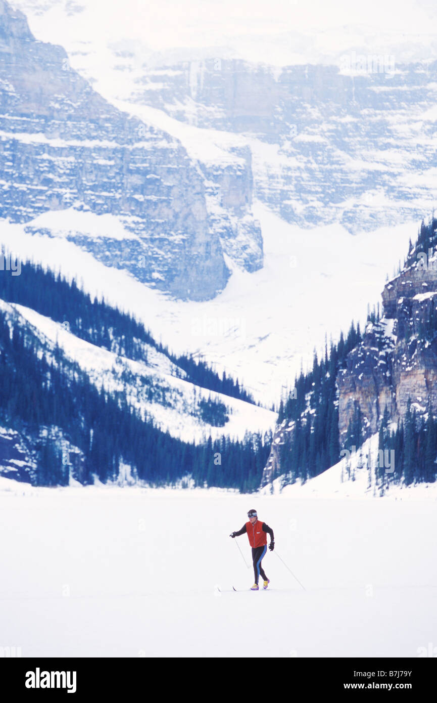 Young woman cross country skiing on Lake Louise, Banff National Park