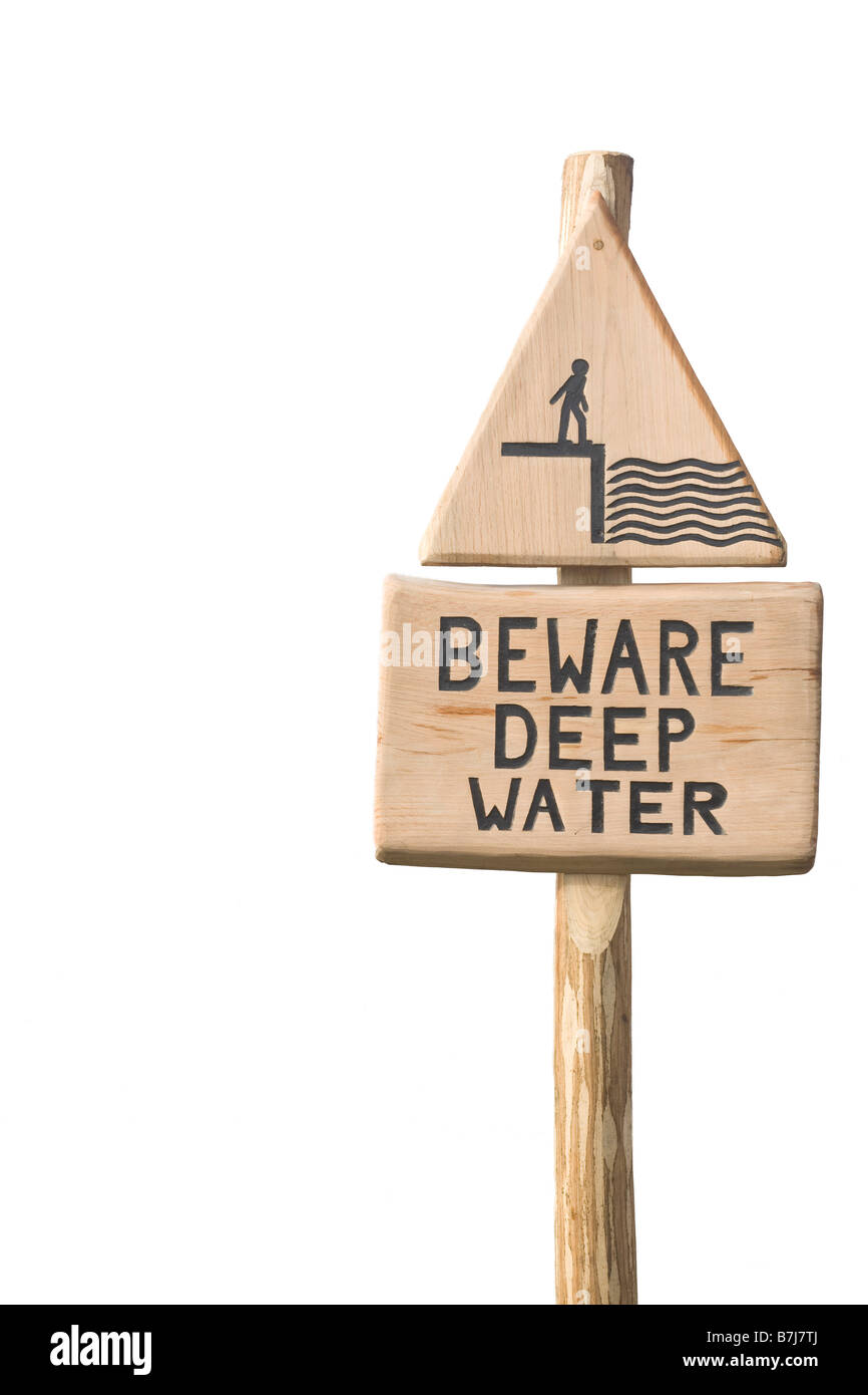 'Beware Deep Water' warning sign in English Countryside near a pond Stock Photo