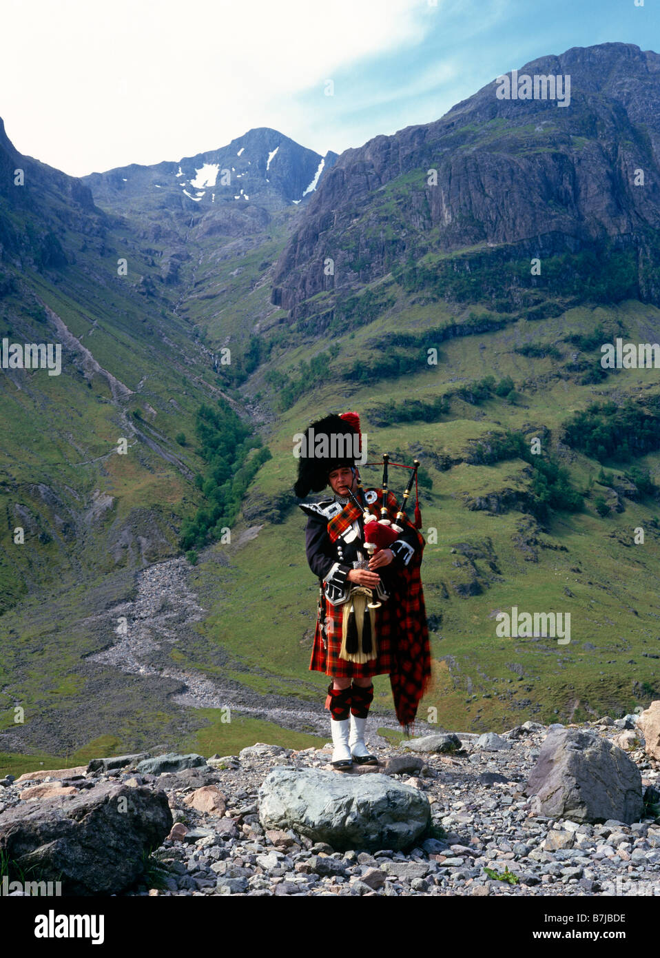 Scottish bagpipe player Glencoe Scotland UK Stock Photo