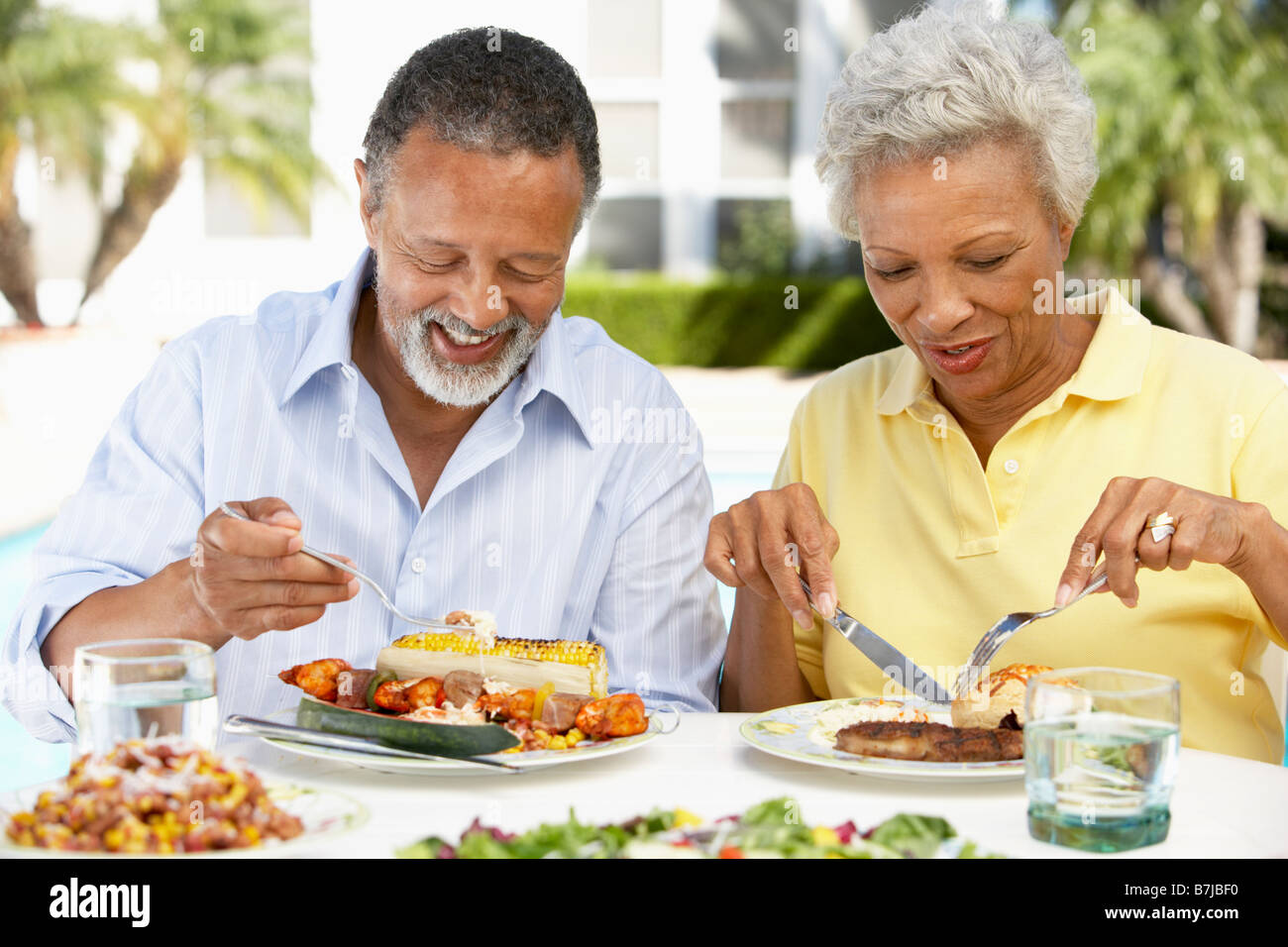 Couple Eating An Al Fresco Meal Stock Photo Alamy