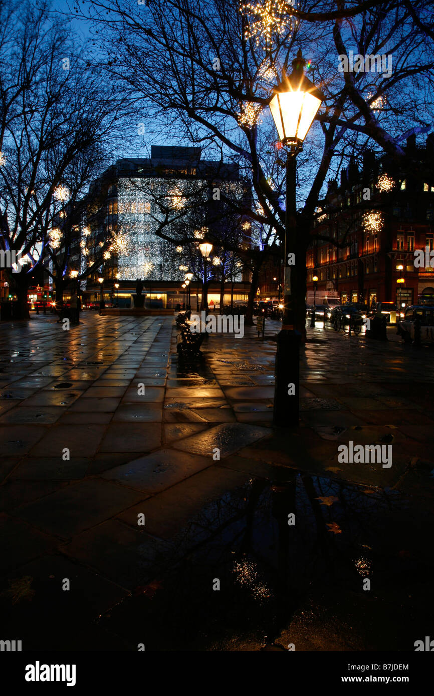 Looking through the Christmas Lights in Sloane Square to Peter Jones