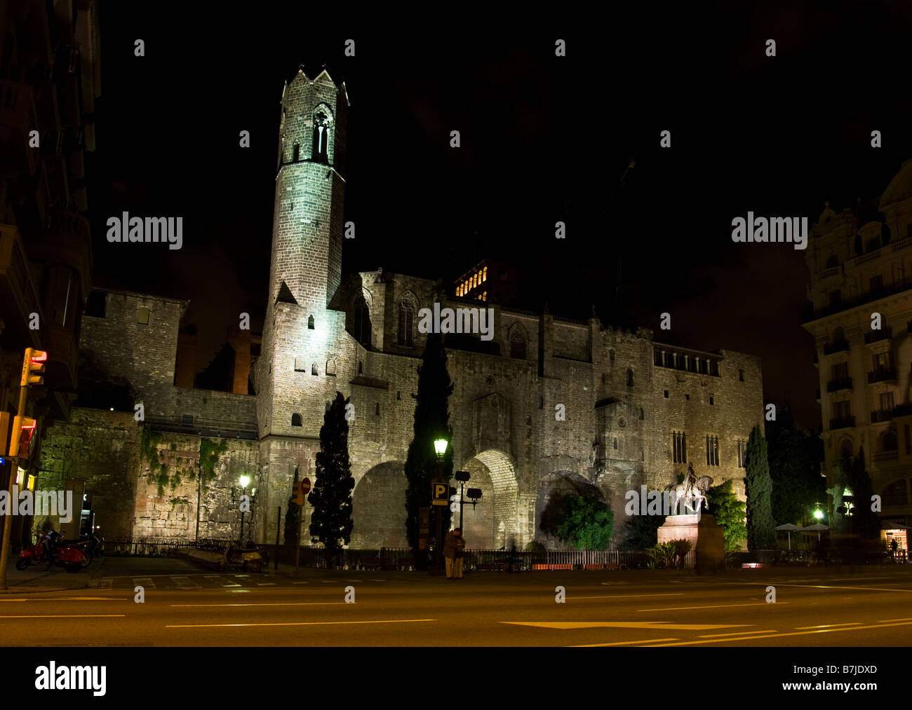 Night view of Royal Mayor Palace at Placa del Rei in Barcelona as viewed from Via Laietana Stock Photo