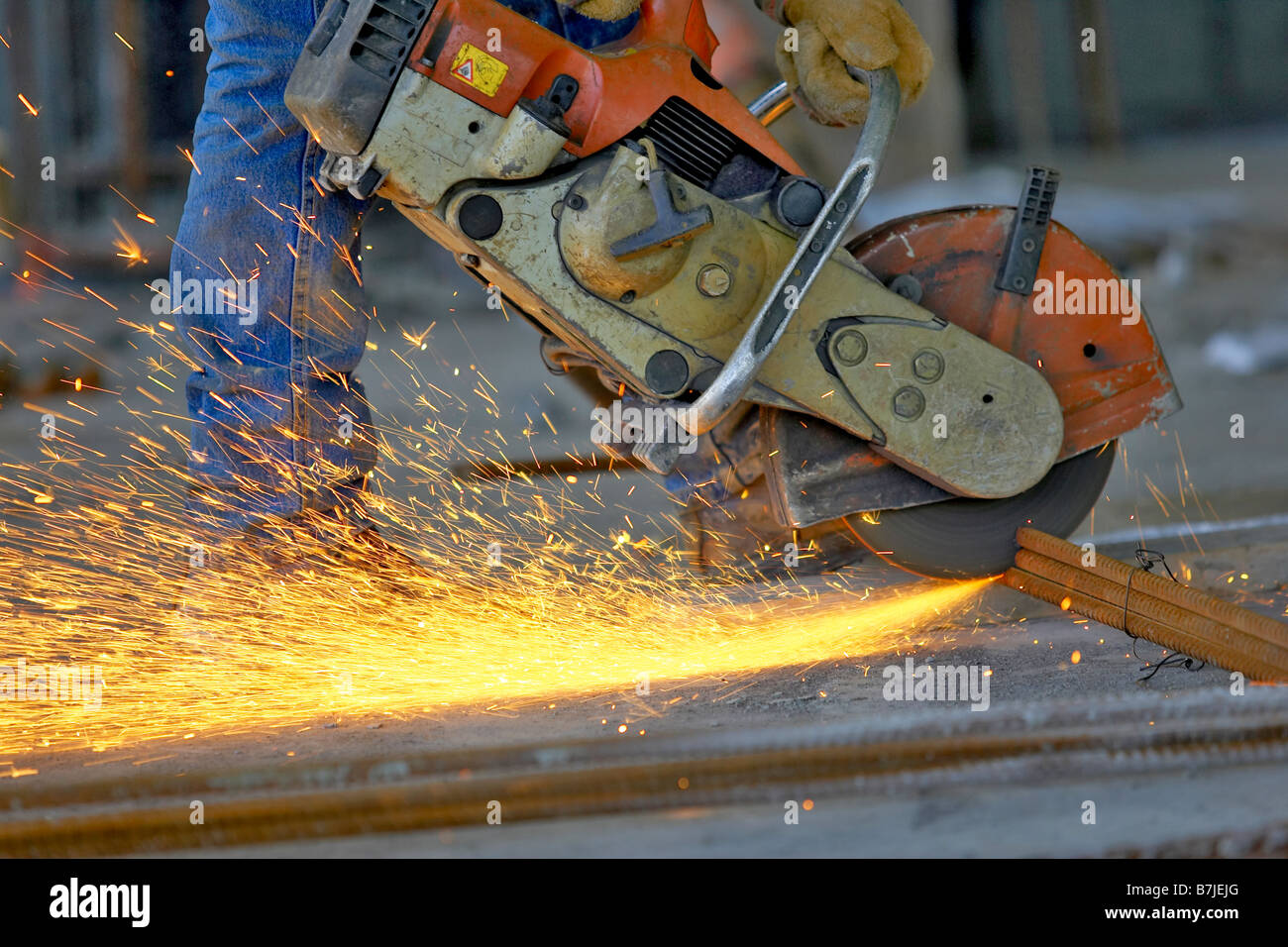 Circular Metal Saw chop Saw Cutting Metal Rebar Bundle Causing Sparks Circular Metal Saw chop Saw Cutting Metal Rebar Bundle Causing Sparks