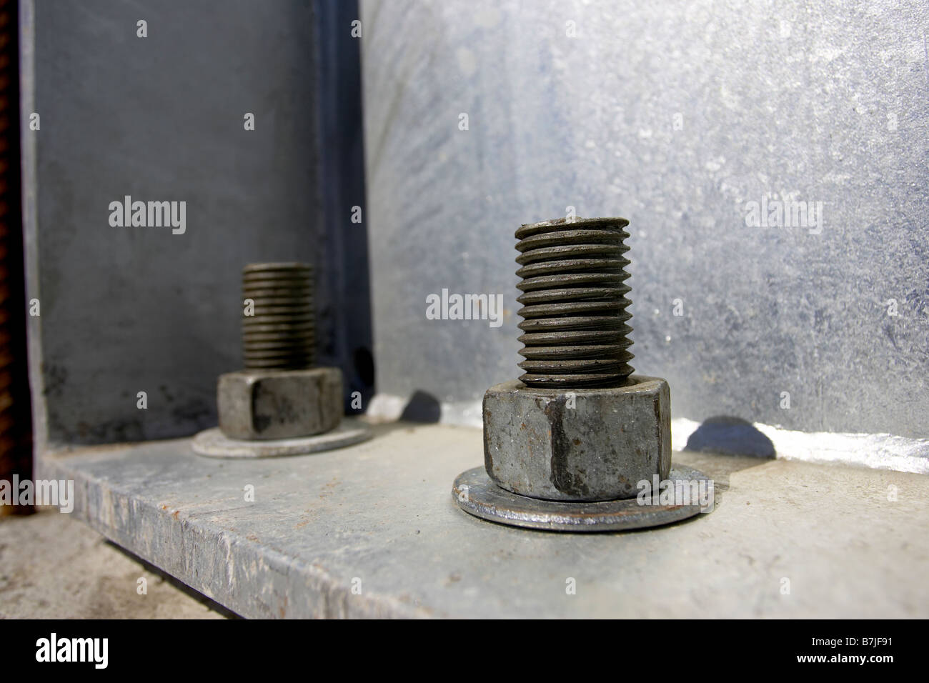 Nut, bolt, and washer attached to steel frame; Canada, Ontario, Hamilton (Composting Facility) Stock Photo