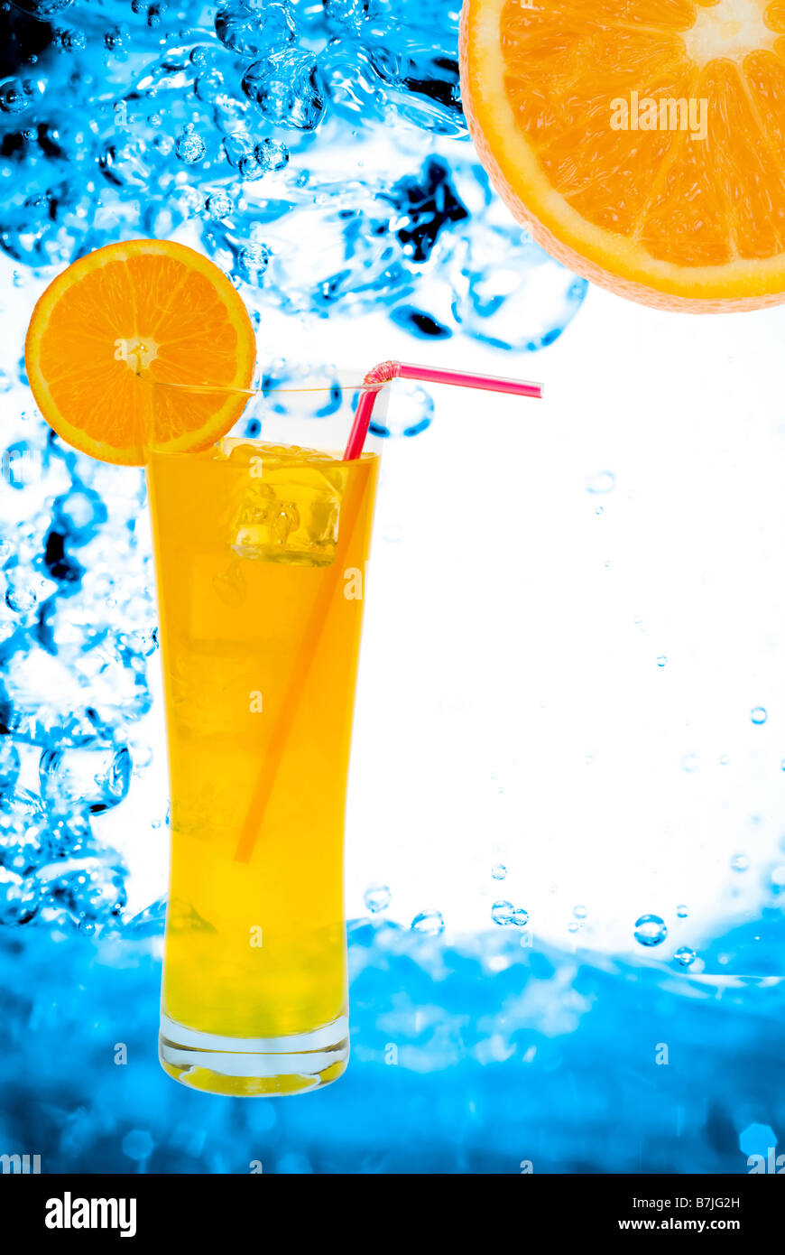 Fresh orange juice with water splash background Stock Photo