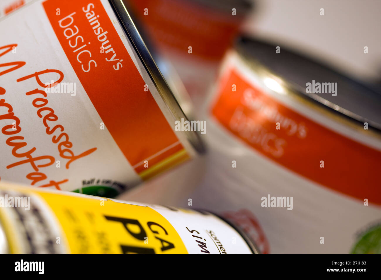 Tins of Somerfield Simply Value and Sainsburys Basics economy range