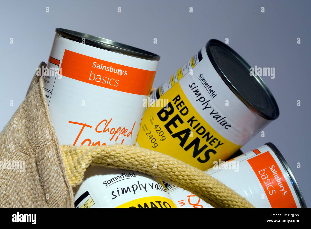 Tins of Somerfield Simply Value and Sainsburys Basics economy range