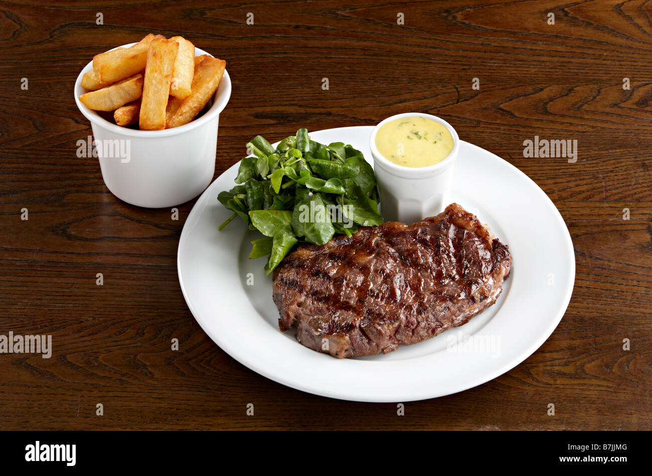 sirloin steak chunky chips watercress bearnaise sauce Stock Photo