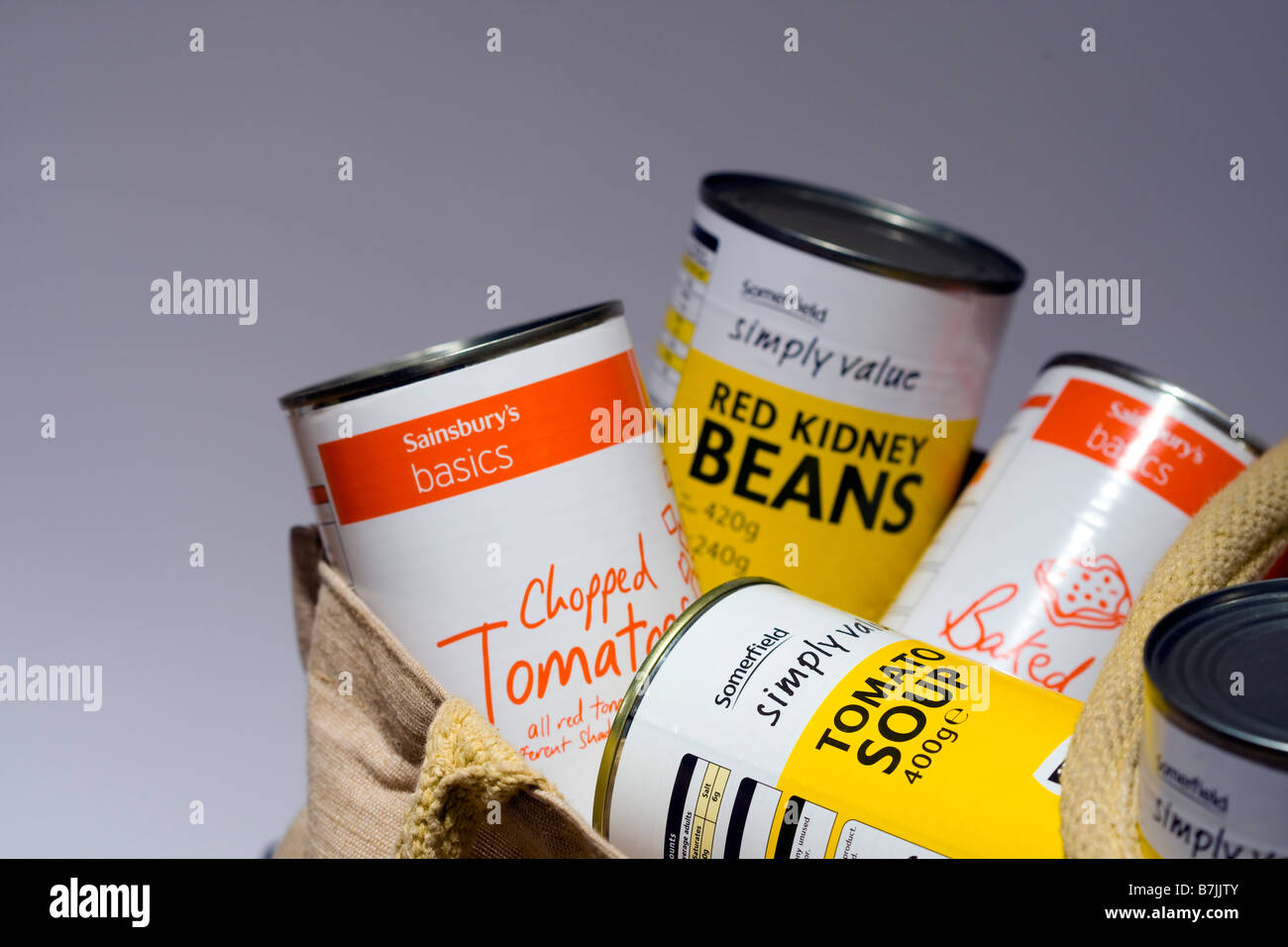 Tins of Somerfield Simply Value and Sainsburys Basics economy range