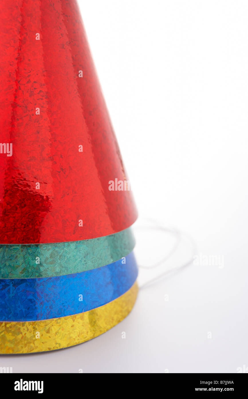 Colored Party Hats Against White Background Stock Photo
