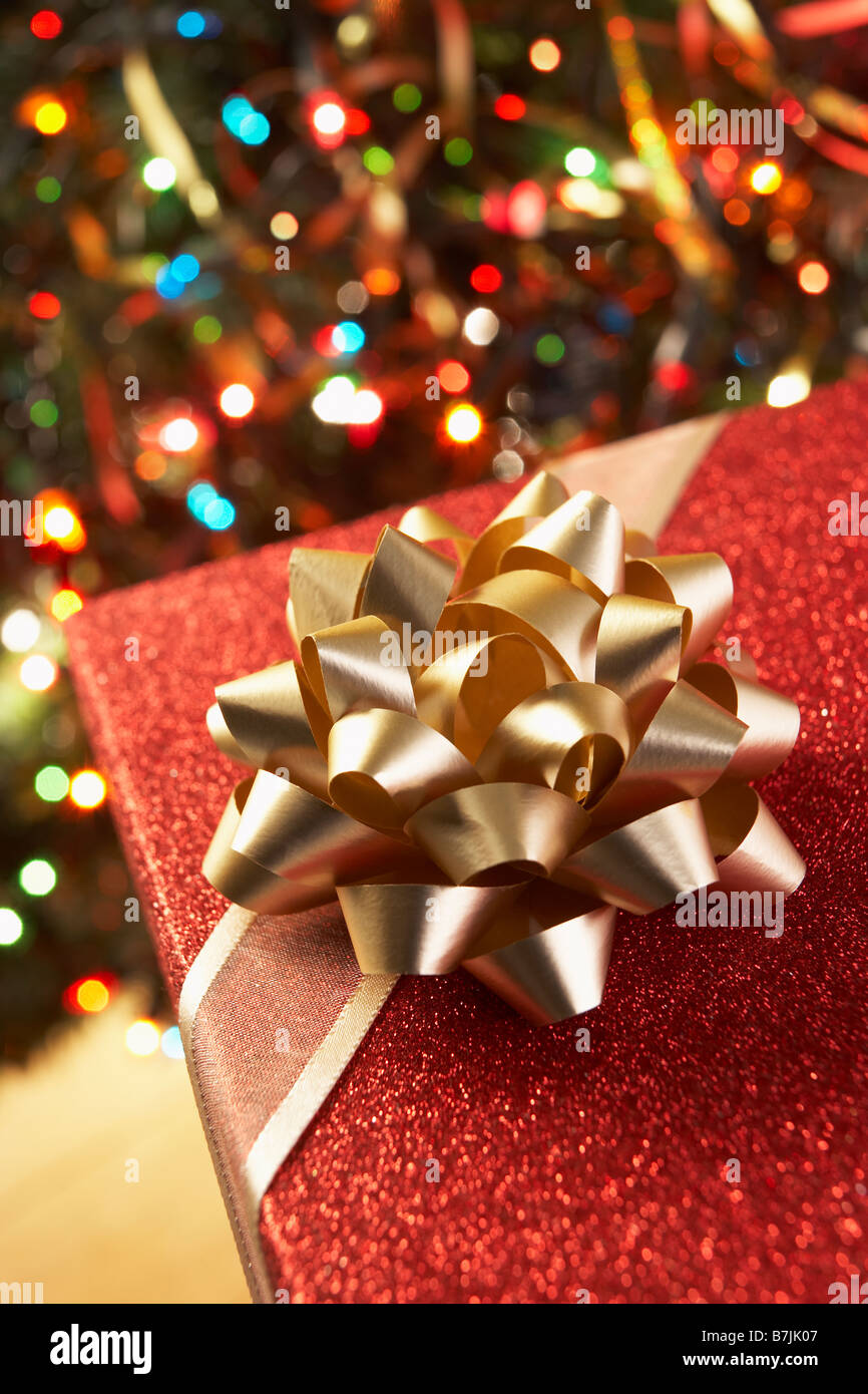Christmas Present Under Christmas Tree Stock Photo