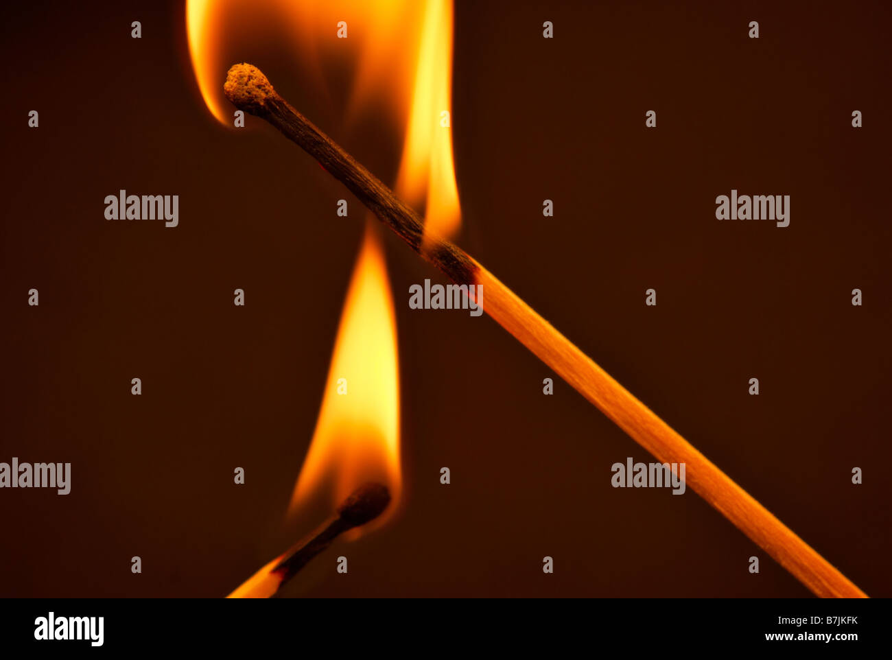 Two burning matches Stock Photo Alamy