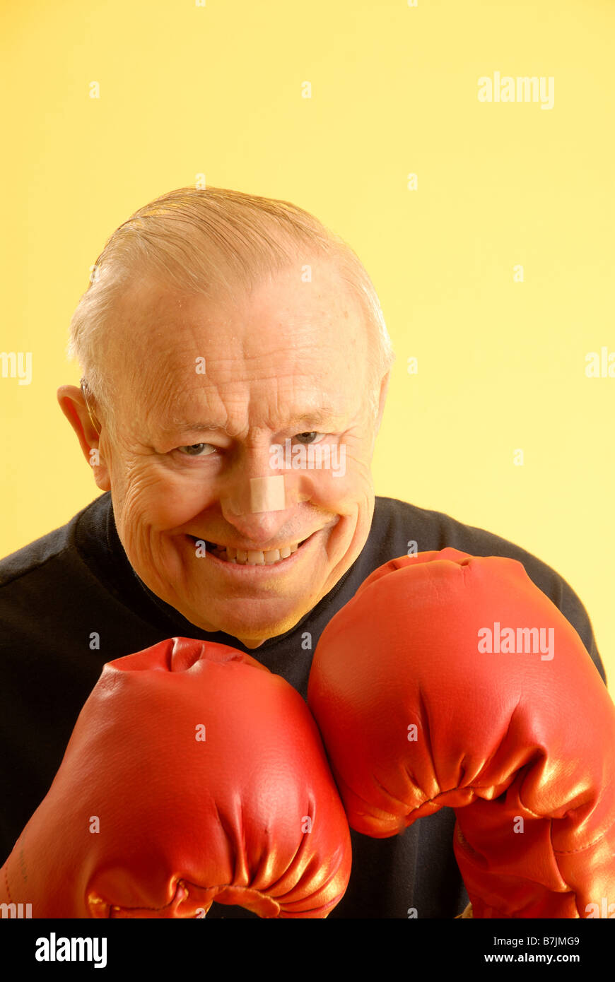 Senior male boxing gloves; Canada, Saskatchewan, Regina Stock Photo Alamy