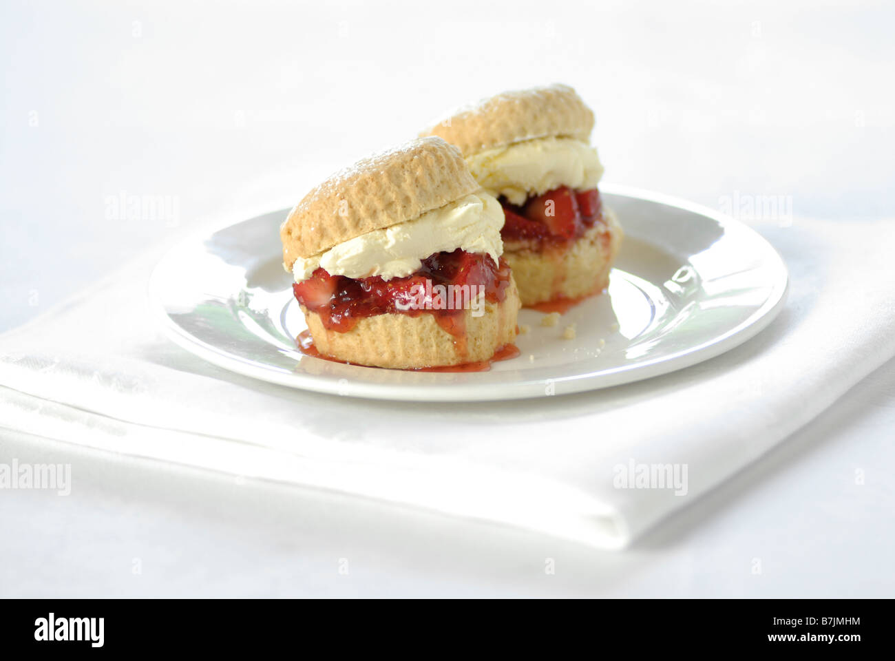 Cornish cream tea with scones, jam and clotted cream Stock Photo