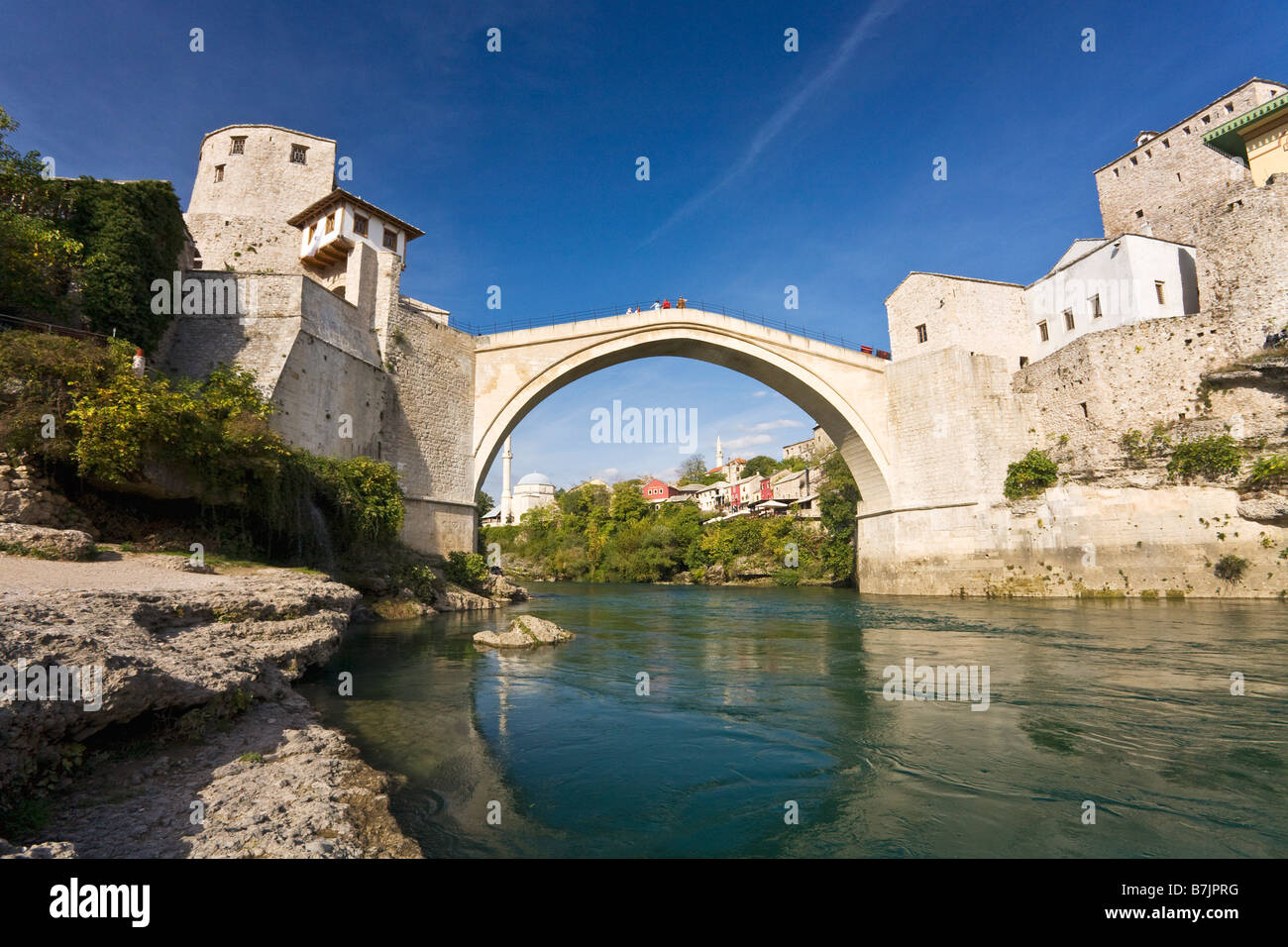 Historic Old Town of Mostar and restored 16th century bridge across the Neretva River in Bosnia Herzegovina Europe Stock Photo