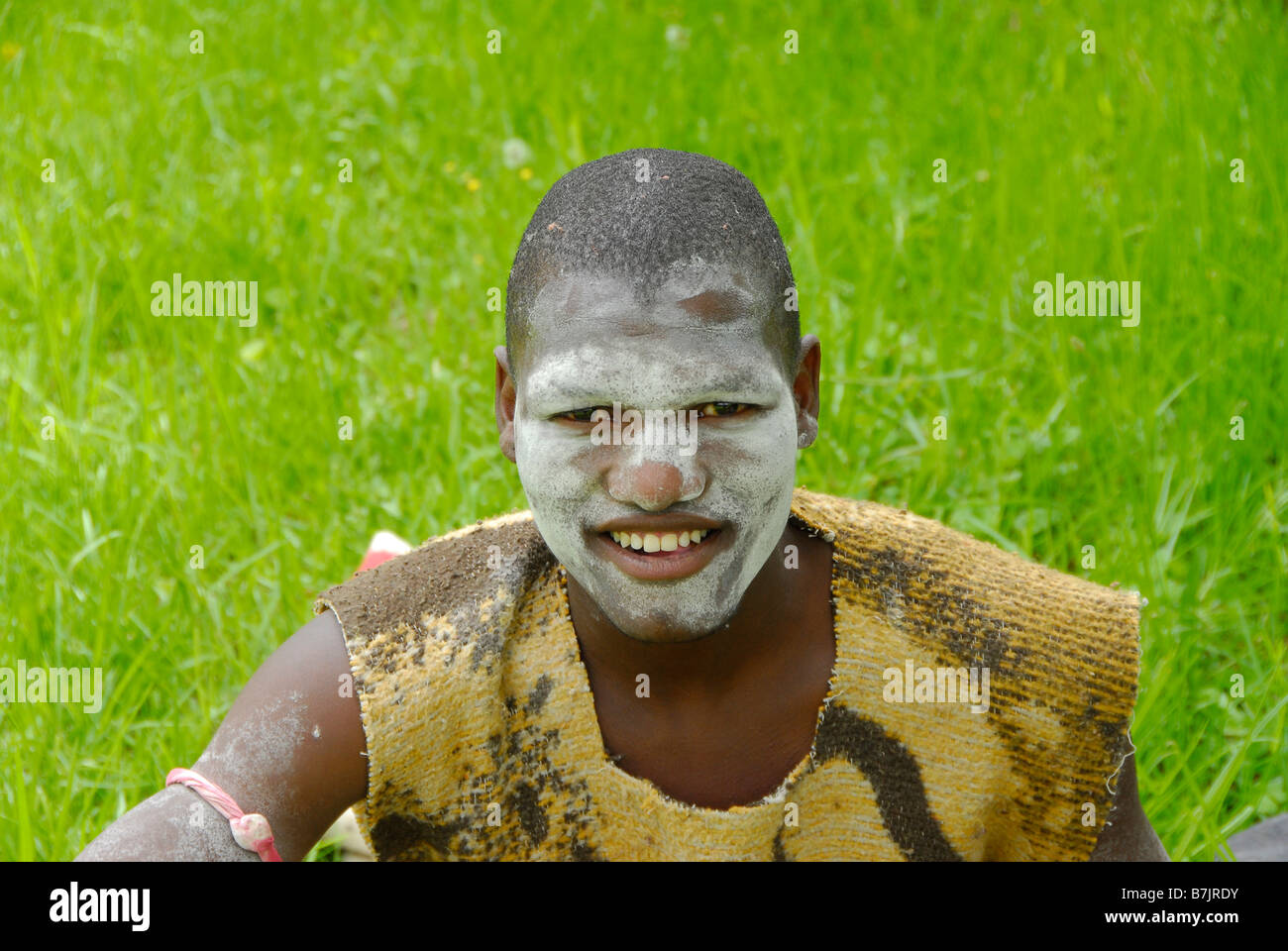 Young Xhosa man with white painted face during initiation period when they are circumcised. He is called a Bakweta. South Africa Stock Photo