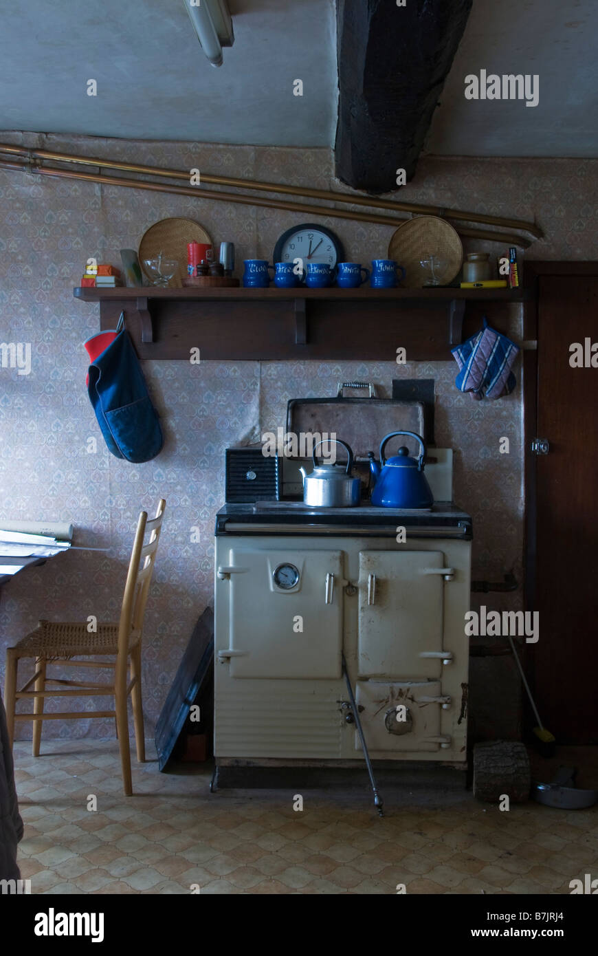 Old Welsh farm kitchen with old Rayburn cooker, UK Stock Photo