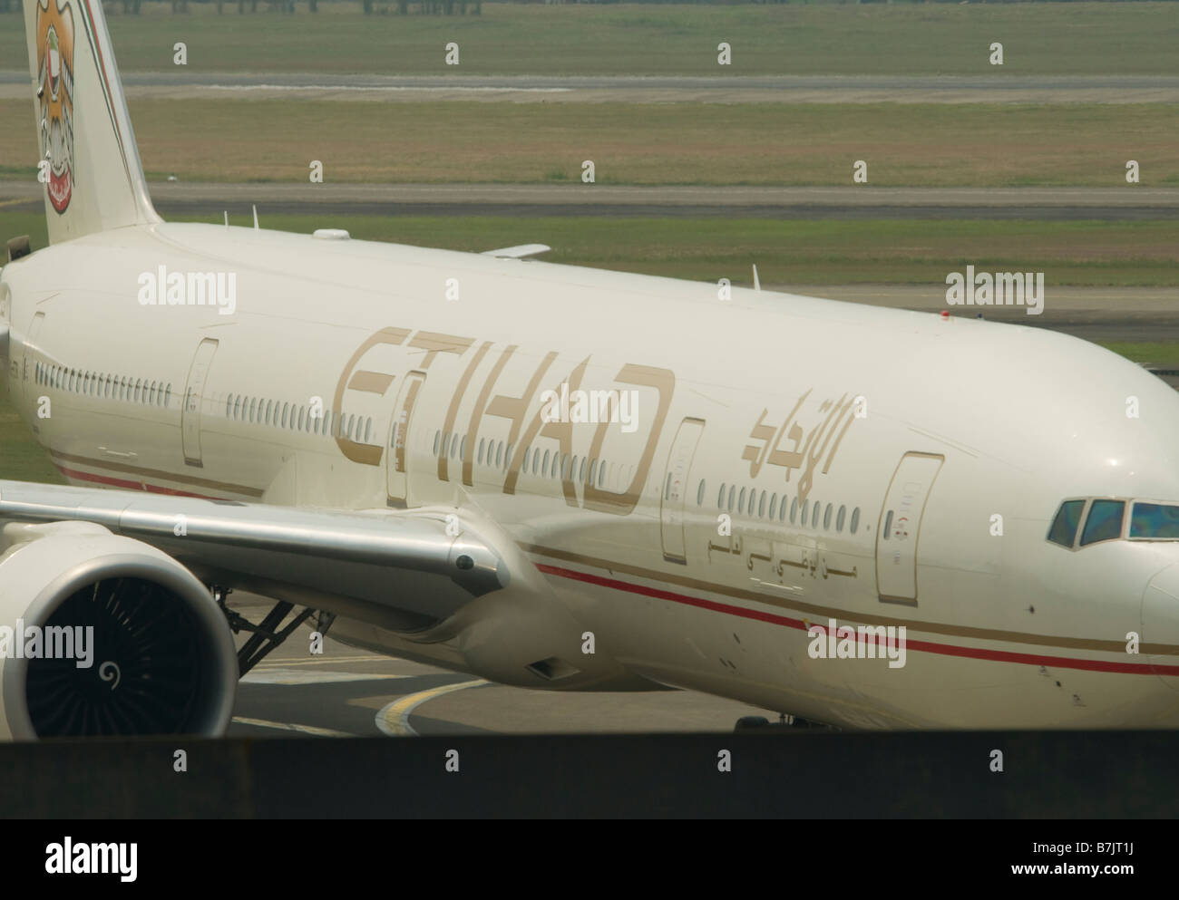 Etihad airline plane on the runway at Jakarta airport Indonesia Stock Photo