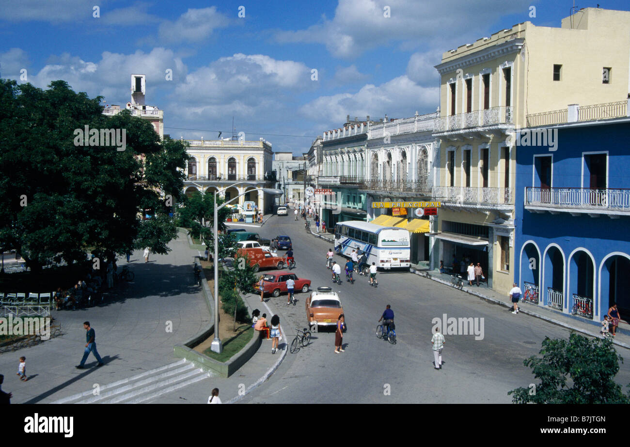 Plaza Houses Colonial style Painted Cars Bicycles People SANCTI