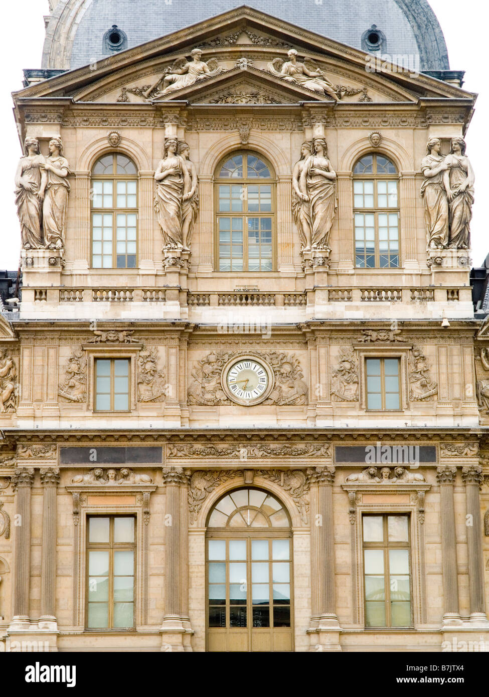 Close up of the Palais du Louvre (home of the Louvre Museum) in Paris ...