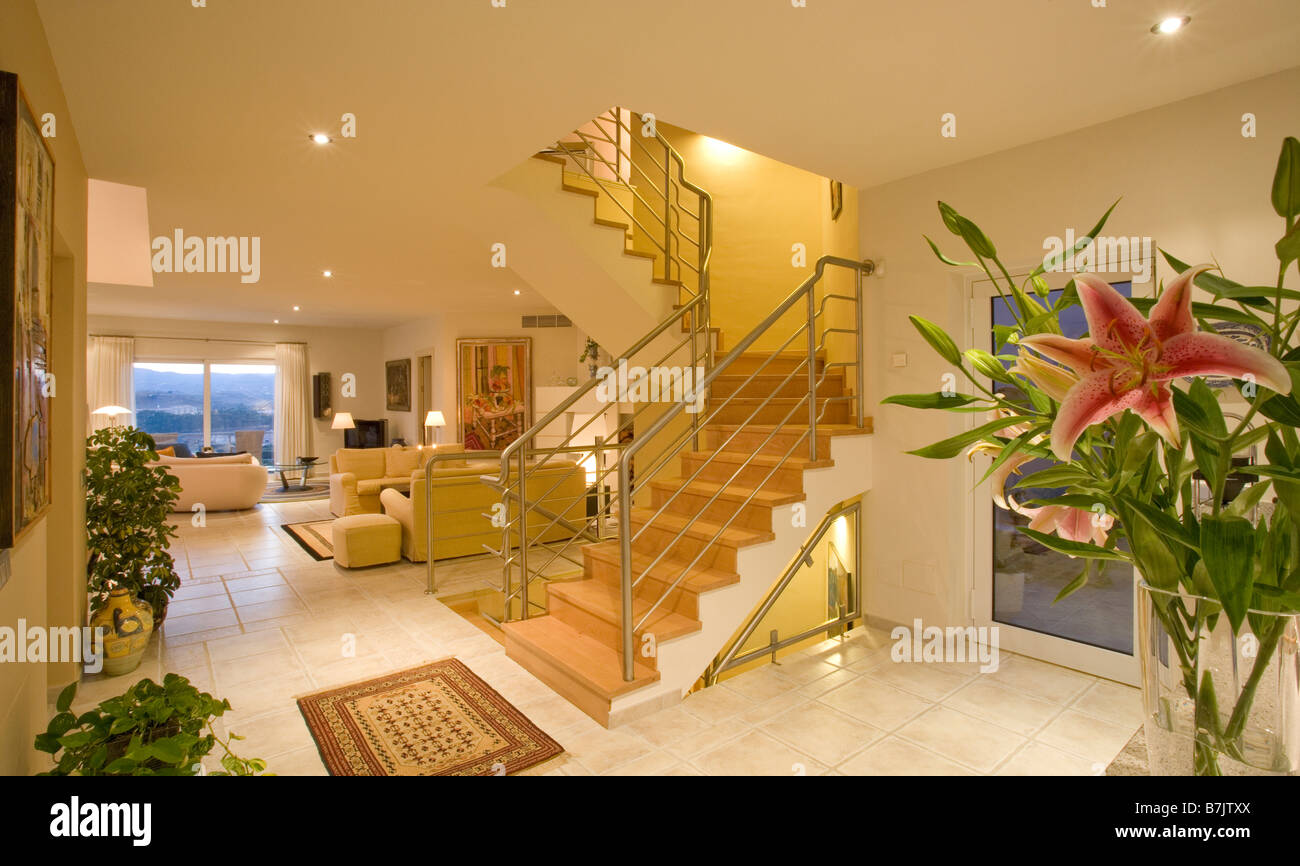 Openplan Living Room And Hall With Staircase To First Floor In