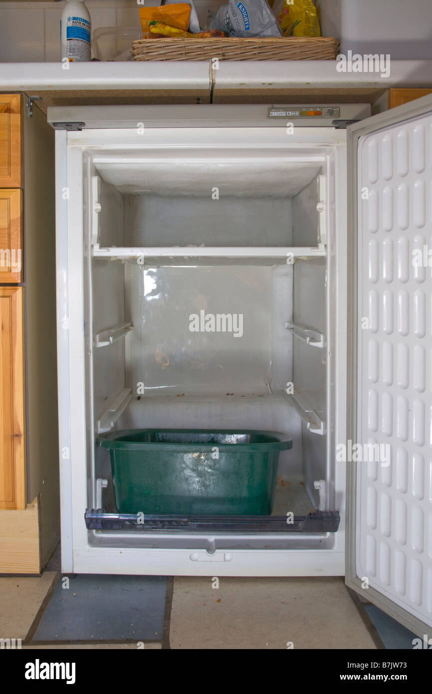 Defrosting a freezer Stock Photo