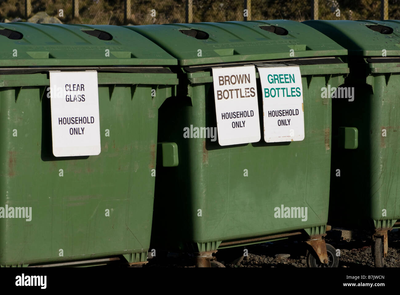 Row of public recycling bins Guernsey Channel Islands United Kingdom Glass recycling Stock Photo