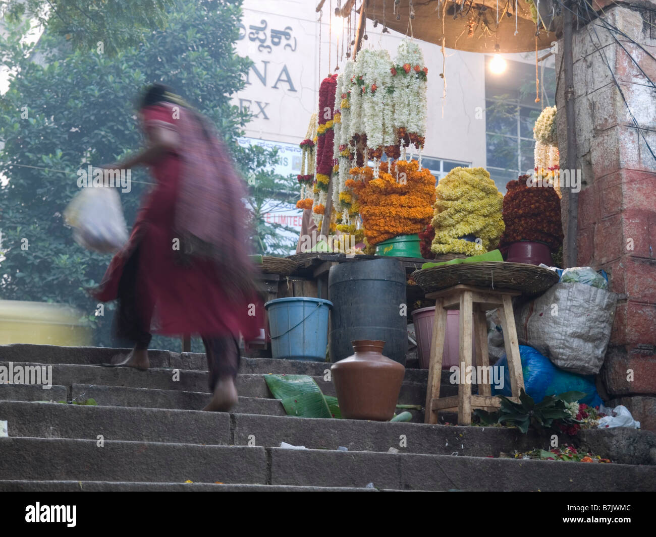 A flower vendor at work Stock Photo Alamy