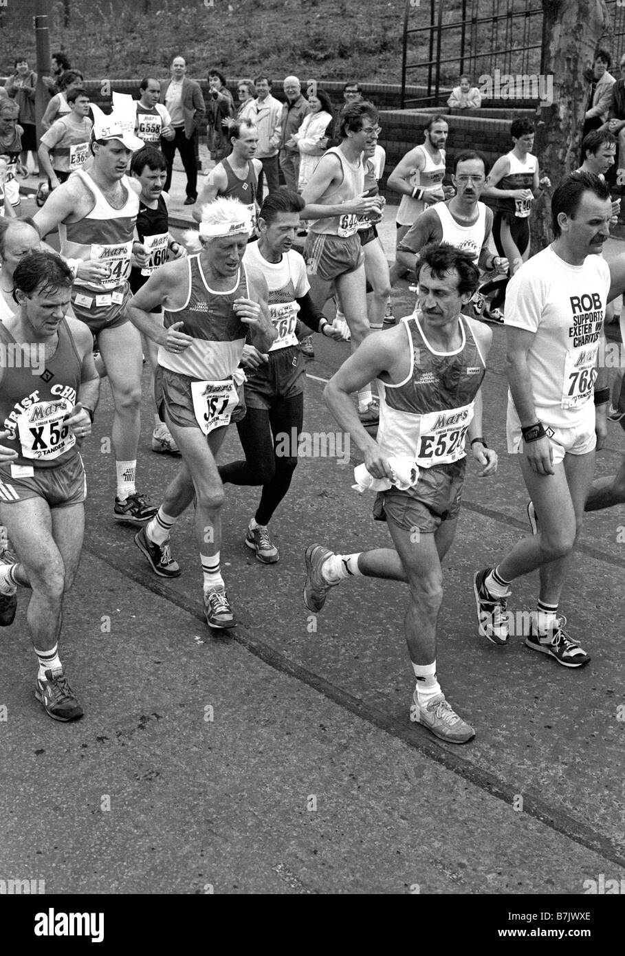 Jimmy Savile running in 1988 London Marathon Stock Photo