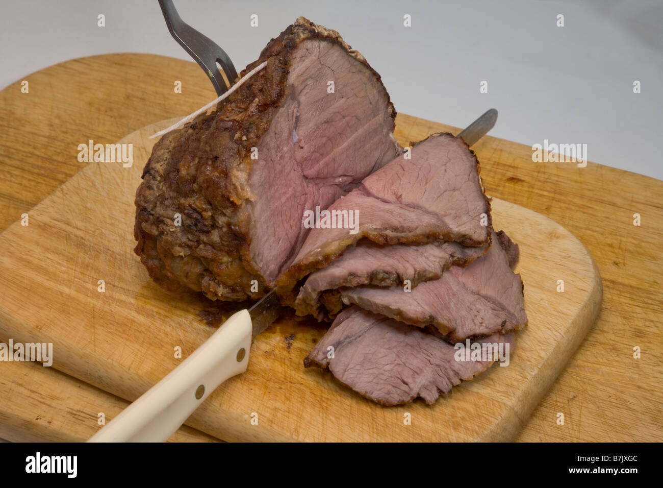 Roast beef ready to carve Stock Photo Alamy