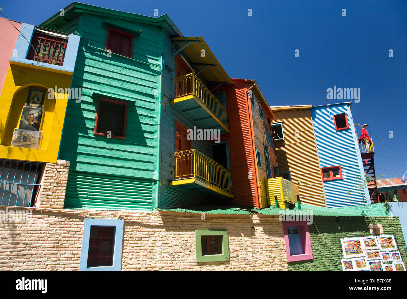 Colourful colorful painted timber and corrugated iron houses in La Boca Buenos Aires Argentina South America Stock Photo