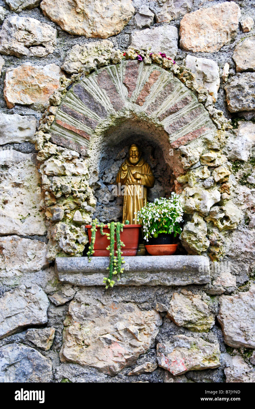 Maratea, on western coast southern Italy, overlooking Policastro Gulf in the Tyrrhenian Sea, founded 8th-C BC by the Greeks: shrine in a wall. Stock Photo