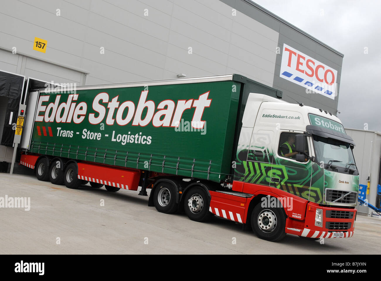 Eddie Stobart lorry onloading at Tesco warehouse distribution centre near Lichfield Stock Photo