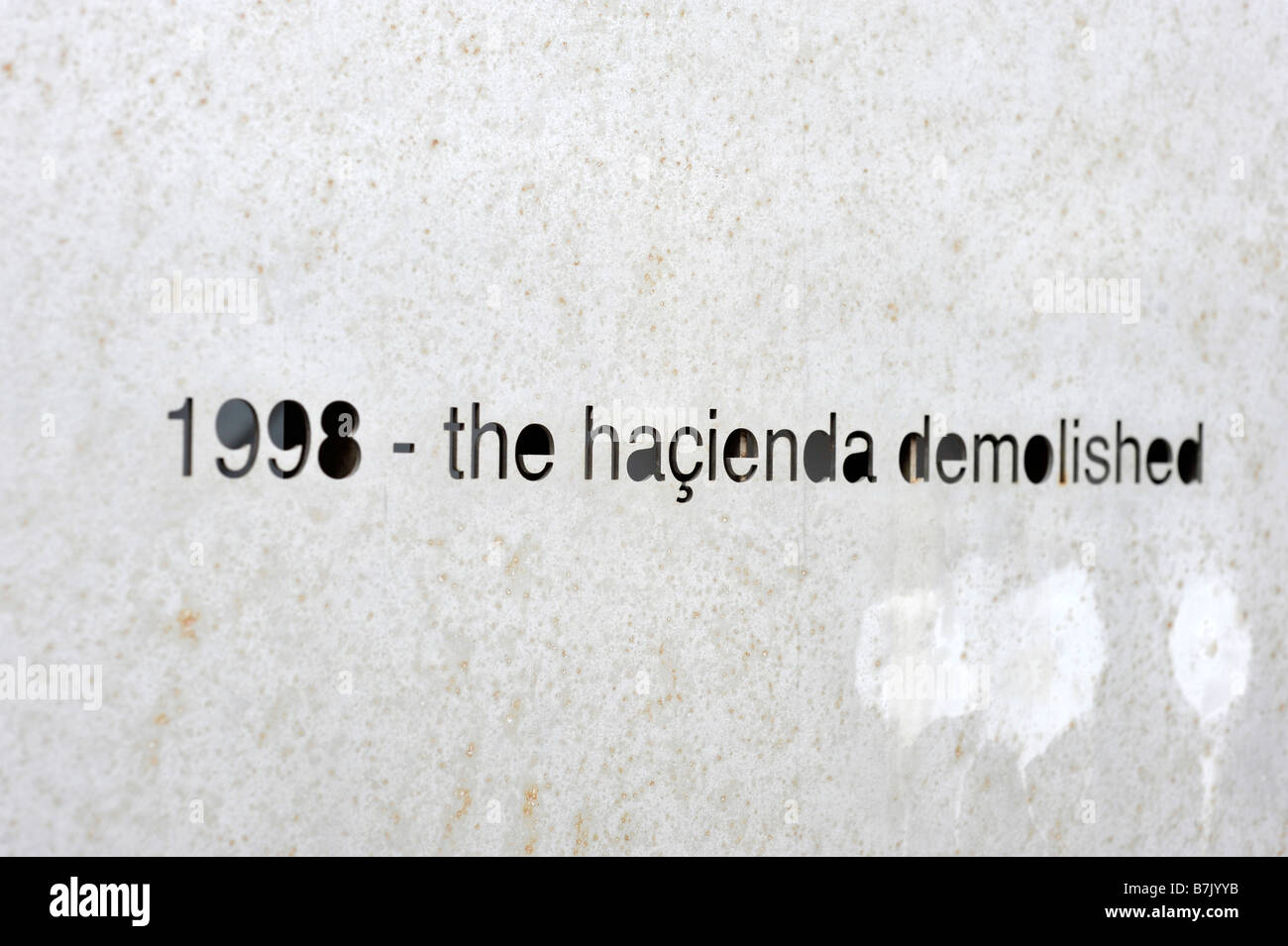 1998 the hacienda demolished metal hacienda memorial plaque factory records nightclub manchester uk england Stock Photo