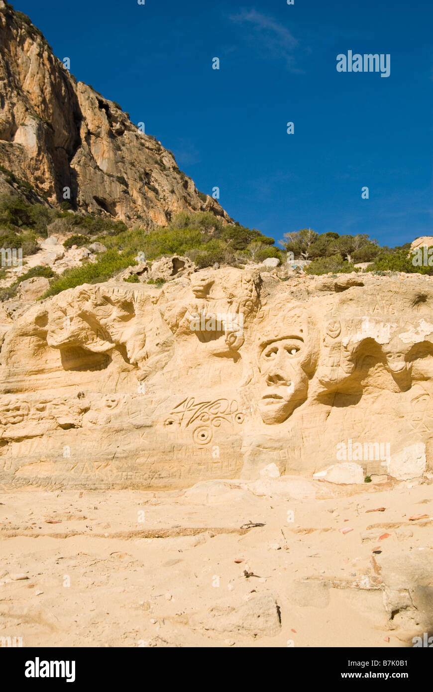 Carvings left by hippies at the old quarry of Sa Pedrera (Atlantis), Ibiza Stock Photo